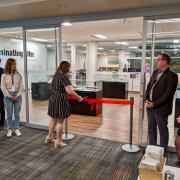 Ribbon-cutting at exhibit opening